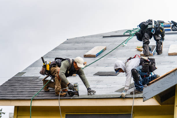 Professional Roofing technician working in Heath, MA
